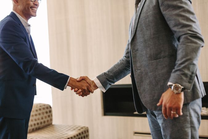 Business people hand shake in office