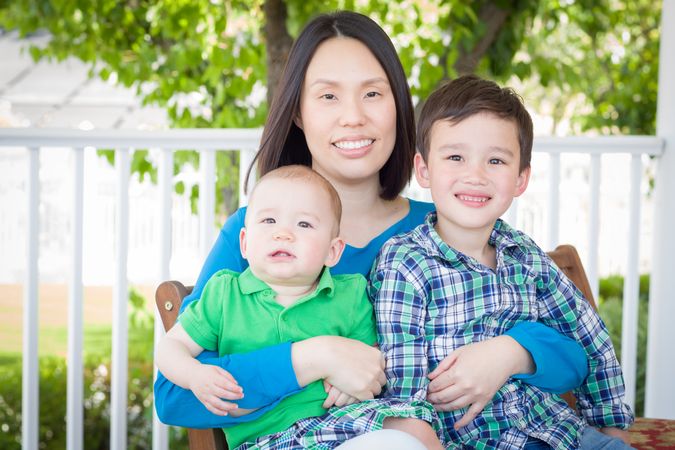 Outdoor Portrait of A Chinese Mother with Her Two Boys