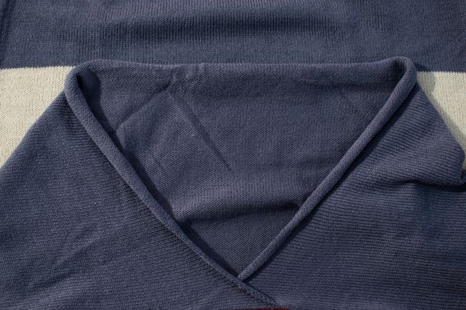 Collar dark grey knitted fabric background texture.