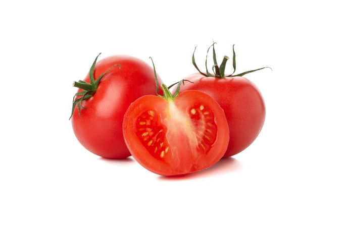 Fresh ripe tomatoes isolated on plain background