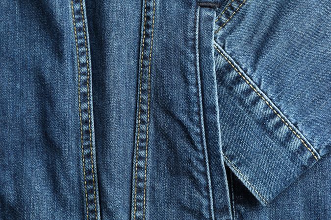 Classic jeans textured background, close up