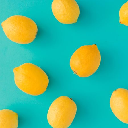 Lemons on bright blue background
