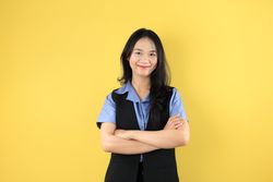 Portrait of the Young Asian Businesswoman with Arms Crossed