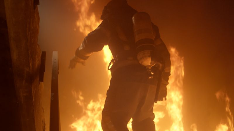 Firefighter fighting fire