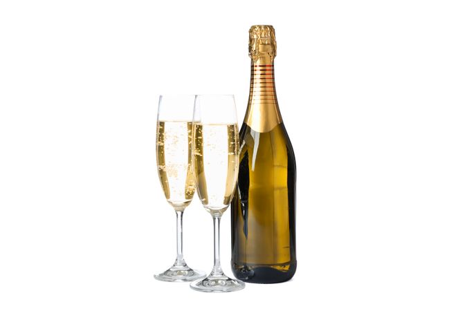 Champagne glasses and bottle isolated on light background