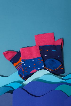 Concept of clothes for legs - socks, space for text