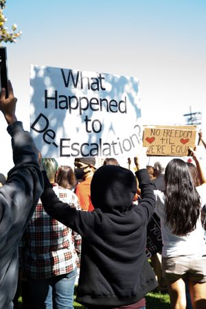 Los Angeles, CA, USA — June 7th, 2020: teen holds sign at rally against police brutality