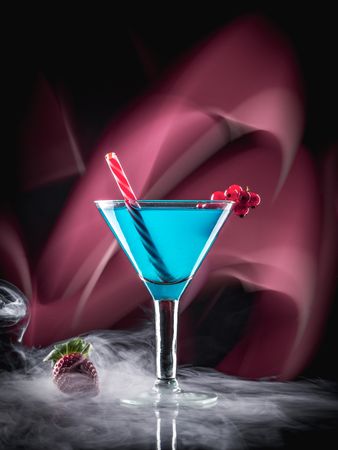 Glass with drink and berries