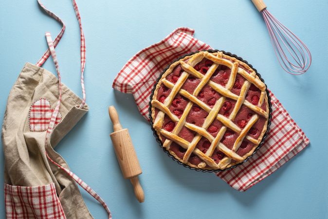Raspberry pie with a lattice crust. Sweet pastry baking concept