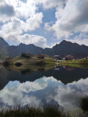 A lake in the mountains with an island