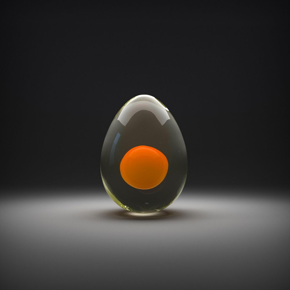 Translucent whole egg on dark background