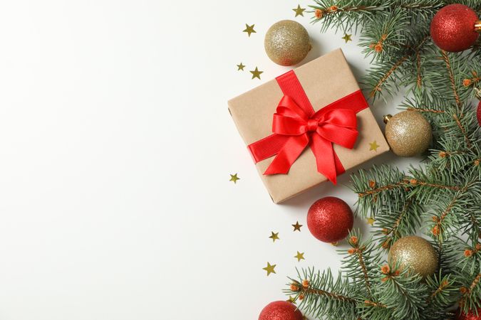 Composition with christmas accessories and tree on blank background, copy space
