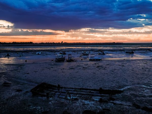 Wreck revealed by the low tide and early light