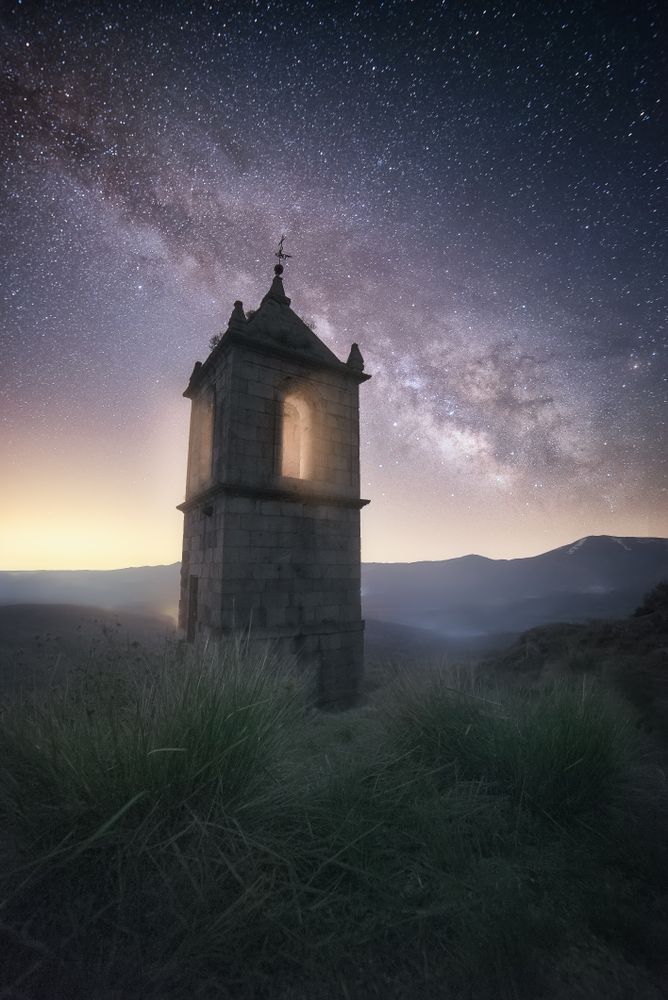 Ancient building under night starry sky