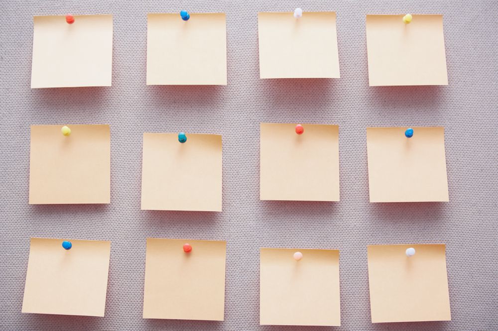 Sticky notes on a bulletin board