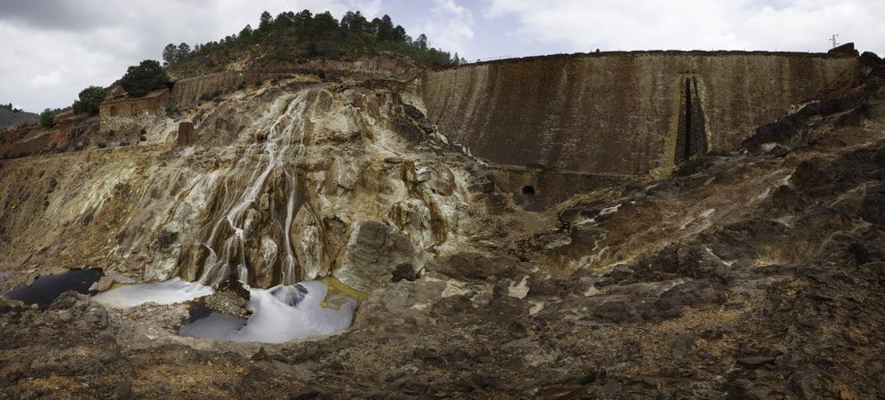 Stream flowing on sandy rock