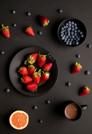 Fruits and hot beverage for breakfast