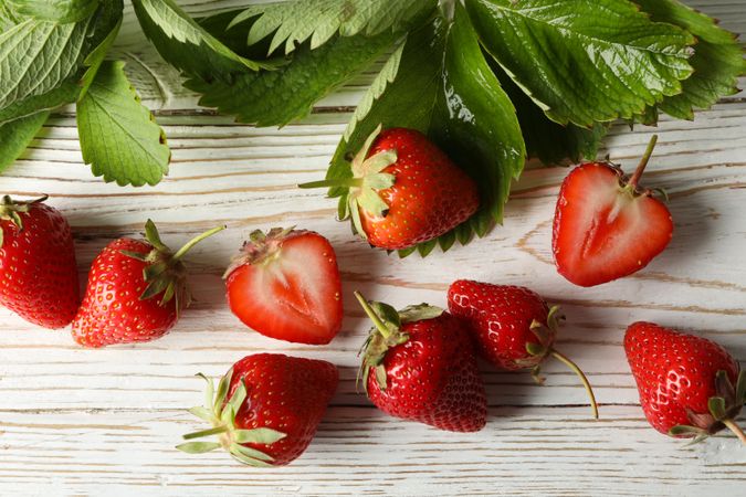 Tasty strawberry on wooden background. Summer berry