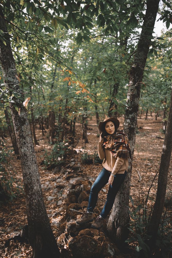 Young woman relaxing in forest