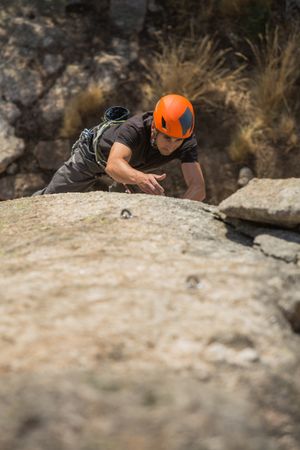 Man climbing a rock