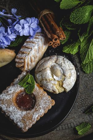 Traditional tea with mint and assorted Arab sweets