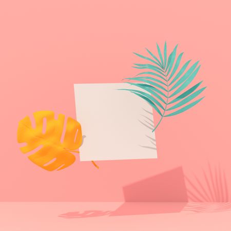 Pink background with green and orange painted palm and monstera leaves with paper card