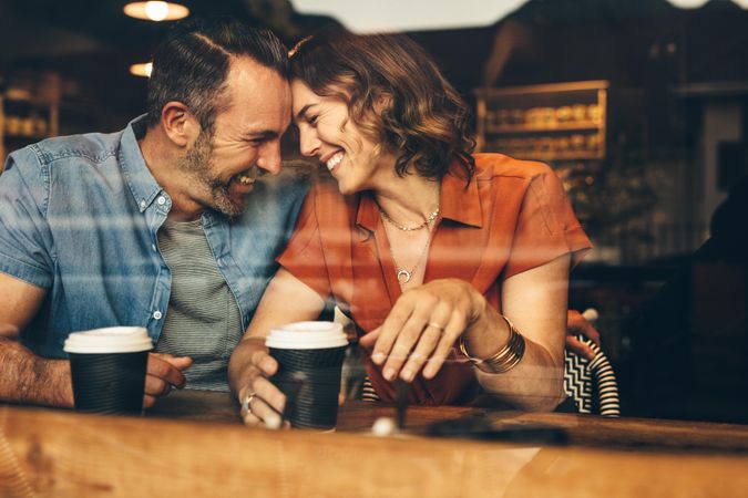 Beautiful couple in love having a coffee date