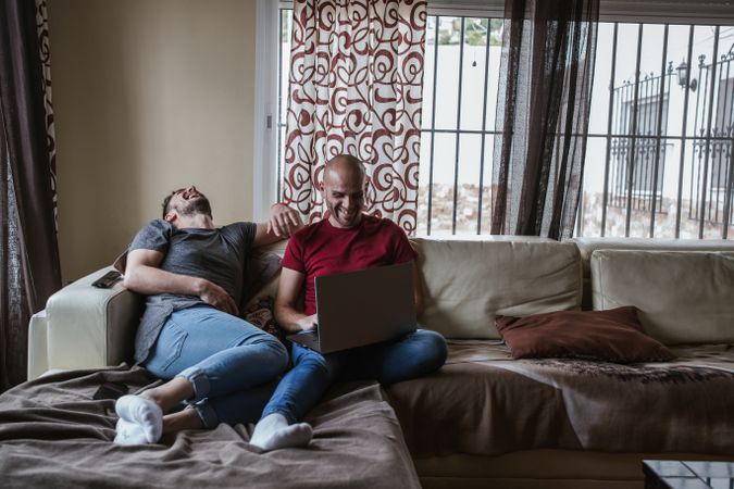 Gay couple with computer