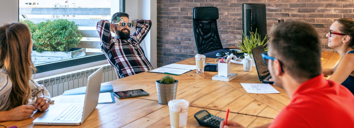 Happy office worker because he goes on vacation