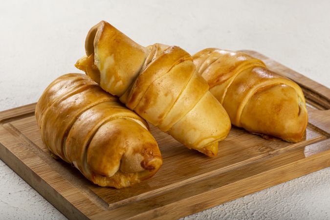 Traditional fresh baked croissants on the table.