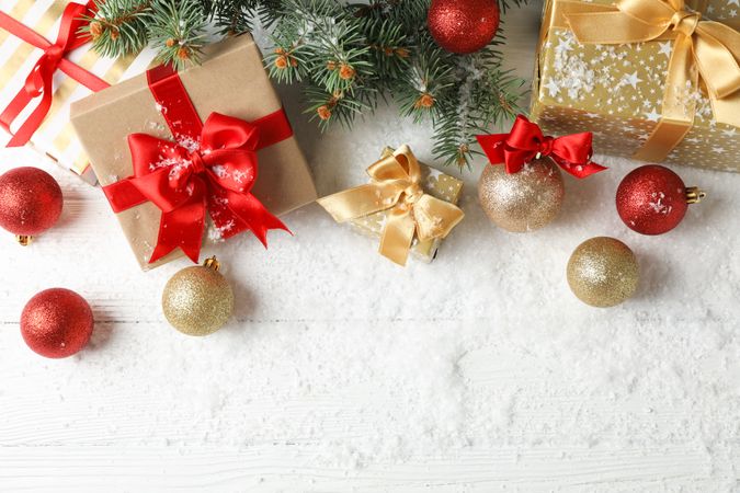 Christmas baubles and accessories on decorated background, copy space