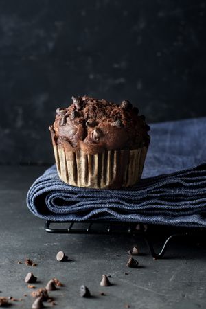 Chocolate banana muffin on towel