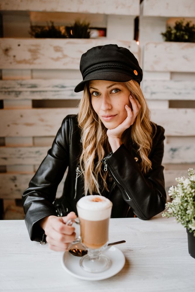 Woman drinking coffee from a glass