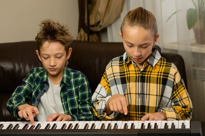Focused Duo Piano Practice