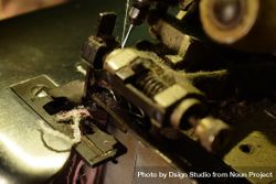 Close up of tailor's bronze sewing machine 47mxZk
