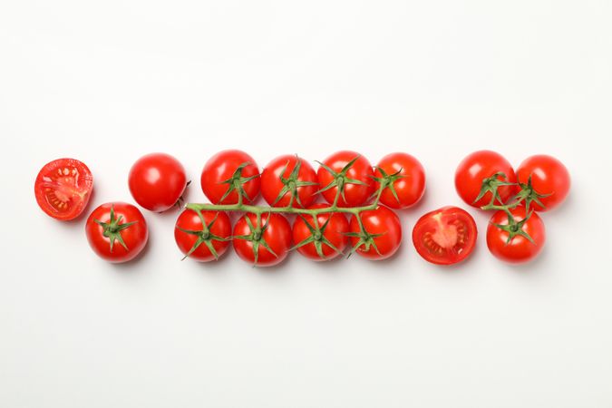 Fresh ripe tomatoes on light background, top view