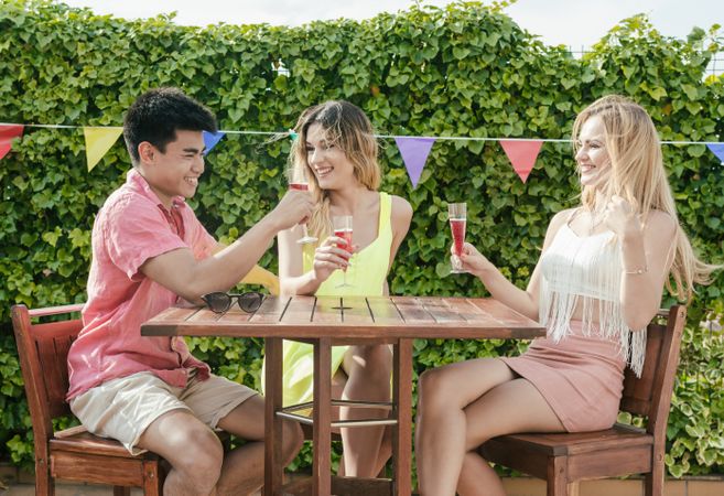 Group of friends drinking sangria on the terrace