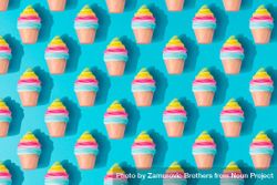 Pattern of colorful rows of ice cream on bright blue background 0ygZL4