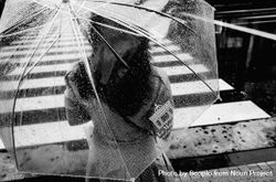 Grayscale photo of woman under transparent umbrella 0J6o80
