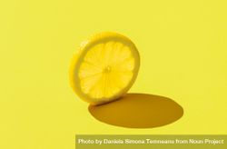 Lemon slice minimalist on a yellow background 0W7O60