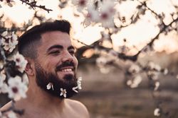 Man with flowers in beard