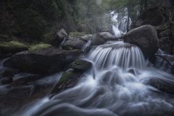 Majestic wild waterfall on rocks