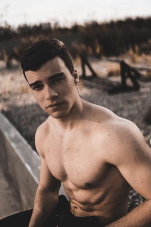 Strong male near concrete wall