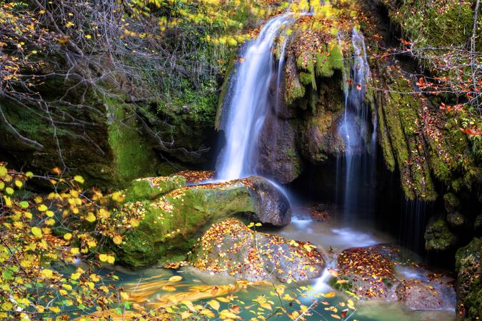Amazing waterfalls of aquifer with bright vegetation