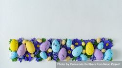 Easter eggs and purple flowers and leaves 0PMxN5
