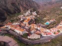 Drone view of city in mountain valley