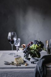 Grapes and wine on table