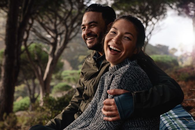 Hiker couple resting after hike