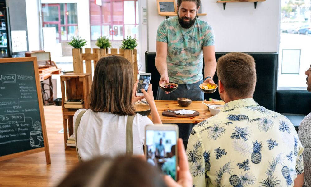 Young cook giving a cooking workshop