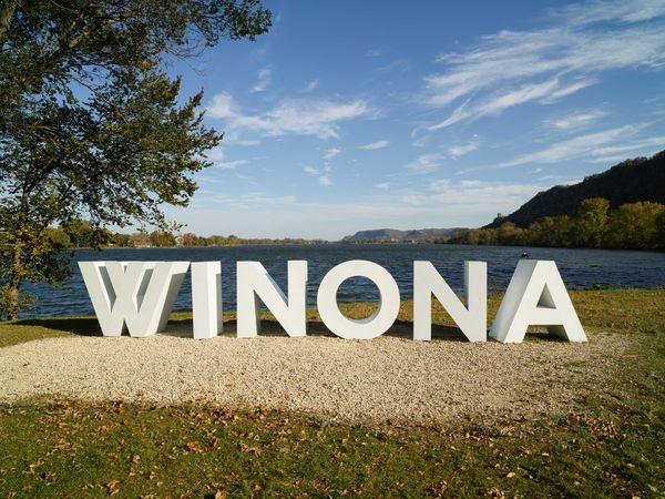 A large Welcome to Winona sculpture of sorts at Lake Park in Winona, Minnesota